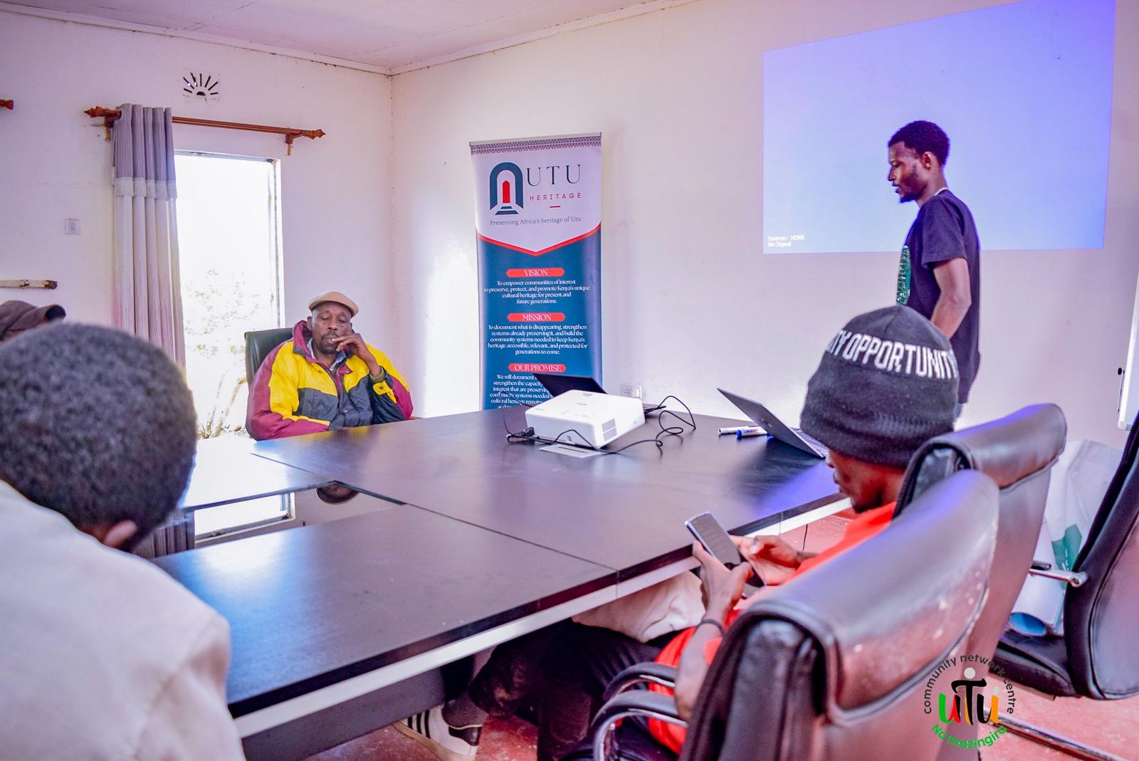 Coordinator John Maigua presenting the Utu na Mazingira plan