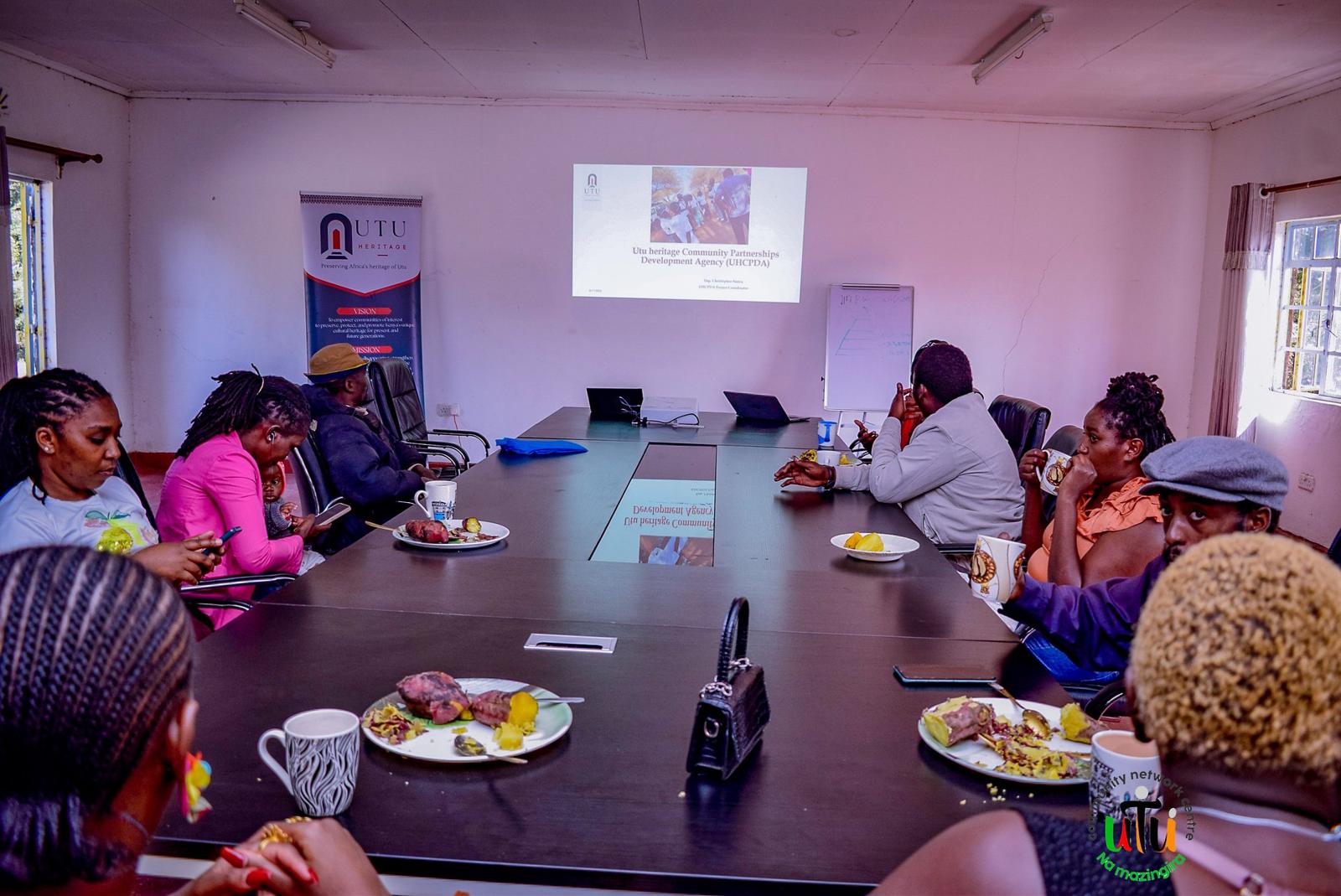 Team members in discussion during the launch session