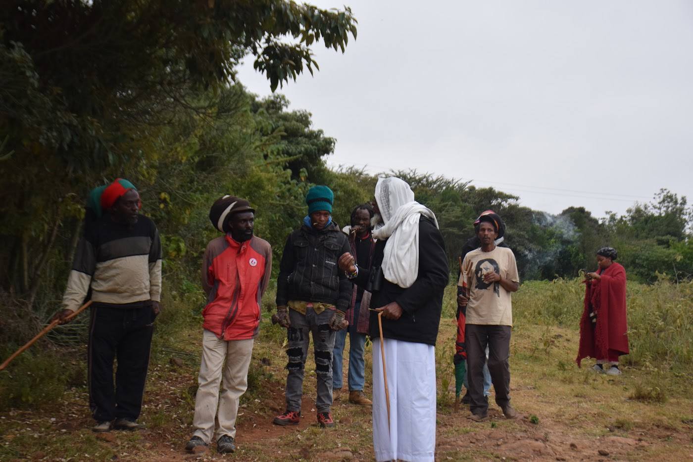 Community members standing in a field at Porini Sanctuary